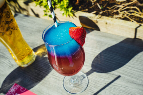 LAKE DISTRICT OUTDOOR DINING - RED AND BLUE SLUSH DRINK