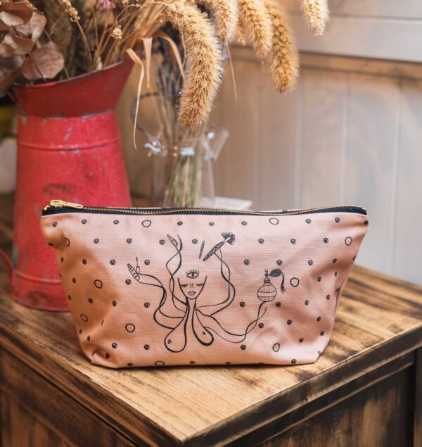 Rita Millat Makeup Bag with pink fabric, gold zip and illustrated design